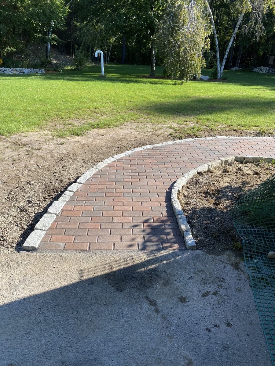 Paver walkway with professional edging in Central Massachusetts