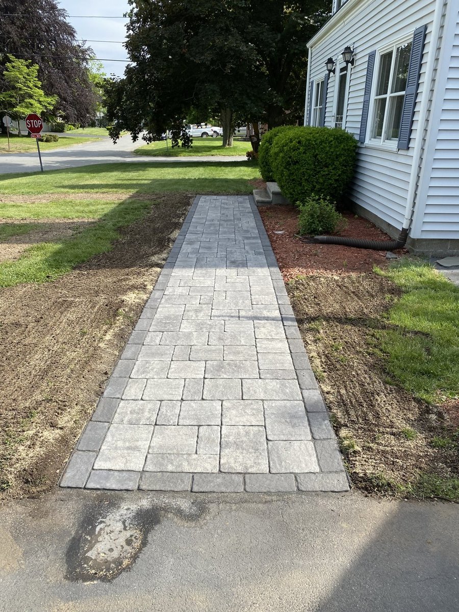 Paver walkway with professional edging in Central Massachusetts