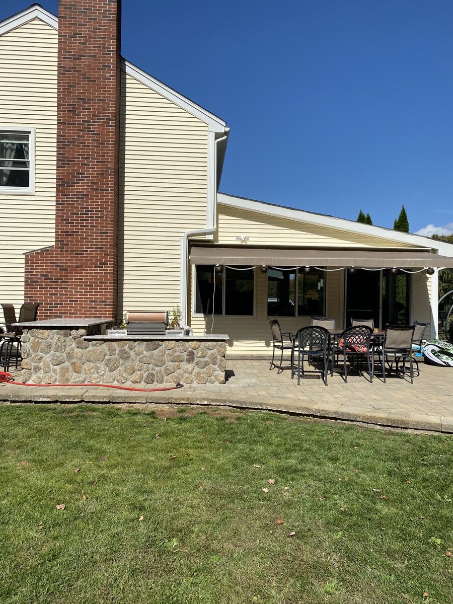Paver patio installation by DNA Landscaping in Westborough, Massachusetts
