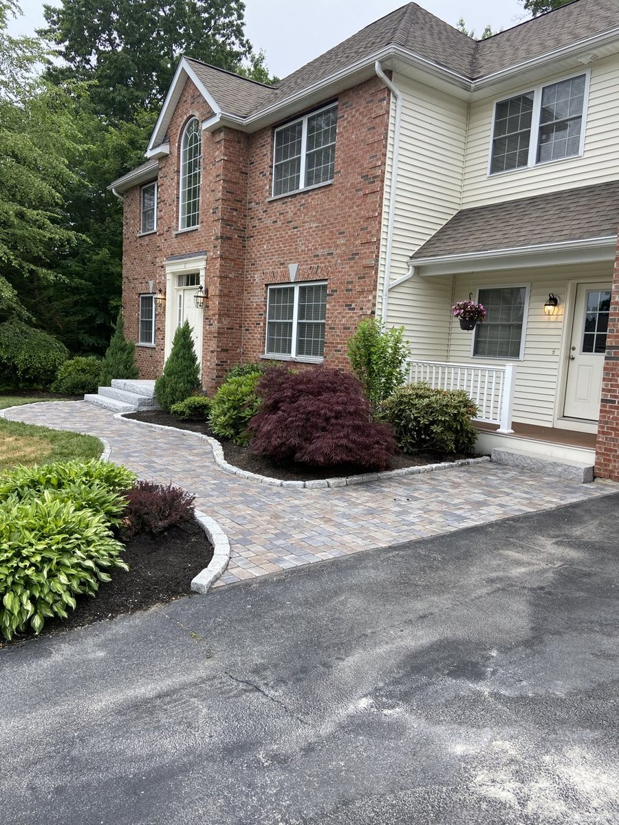 Paver walkway with professional edging in Central Massachusetts
