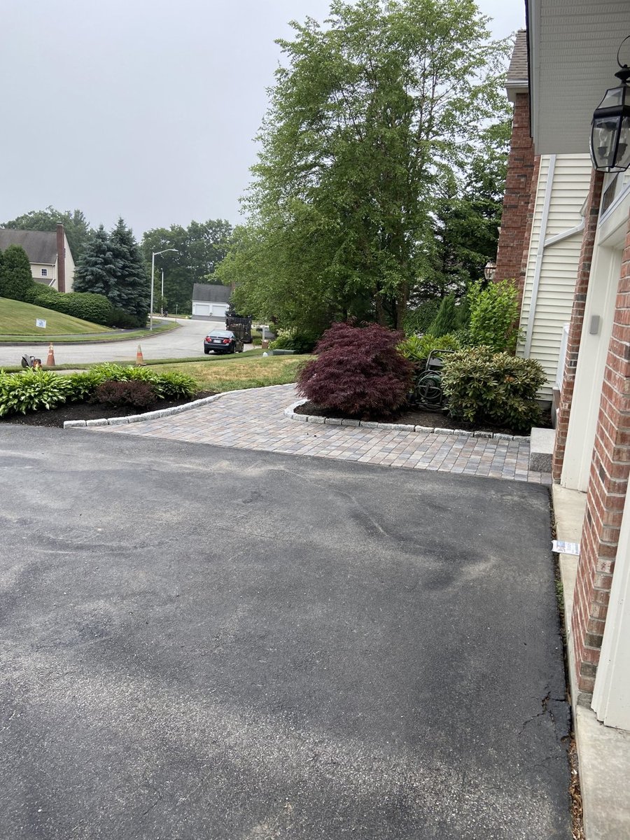 Paver walkway with professional edging in Central Massachusetts