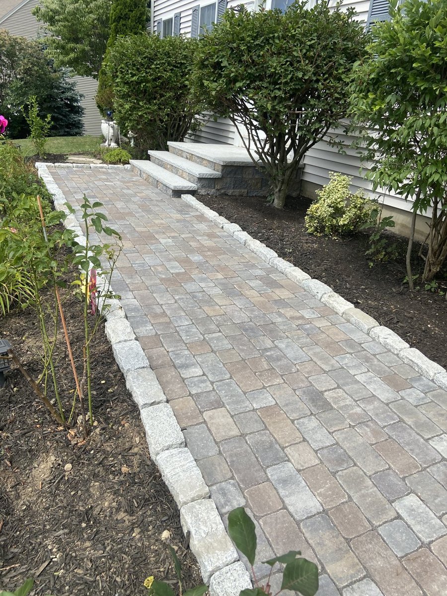 Paver walkway with professional edging in Central Massachusetts